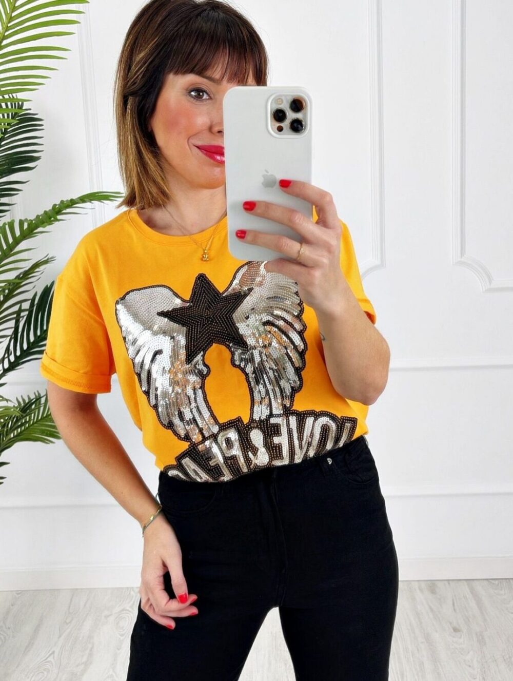 Camiseta alas lentejuelas naranja