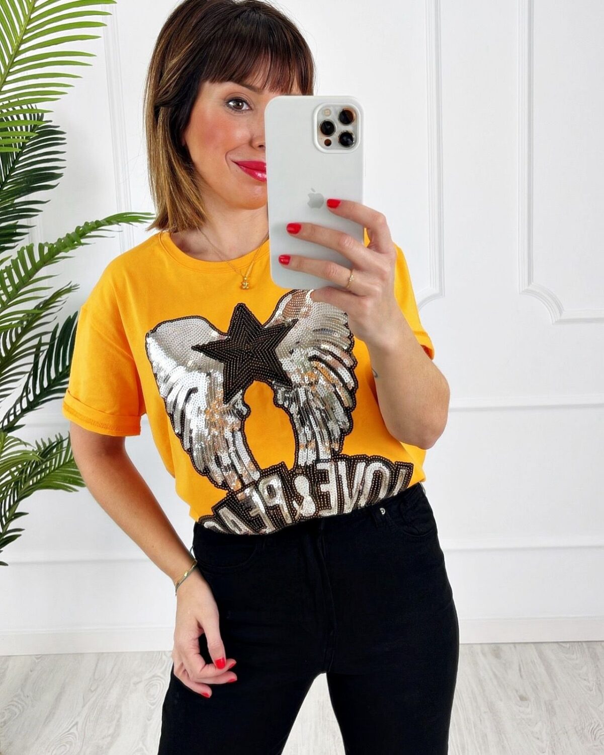 Camiseta alas lentejuelas naranja