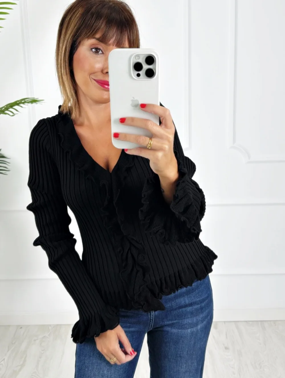 Jersey botones volantes negro