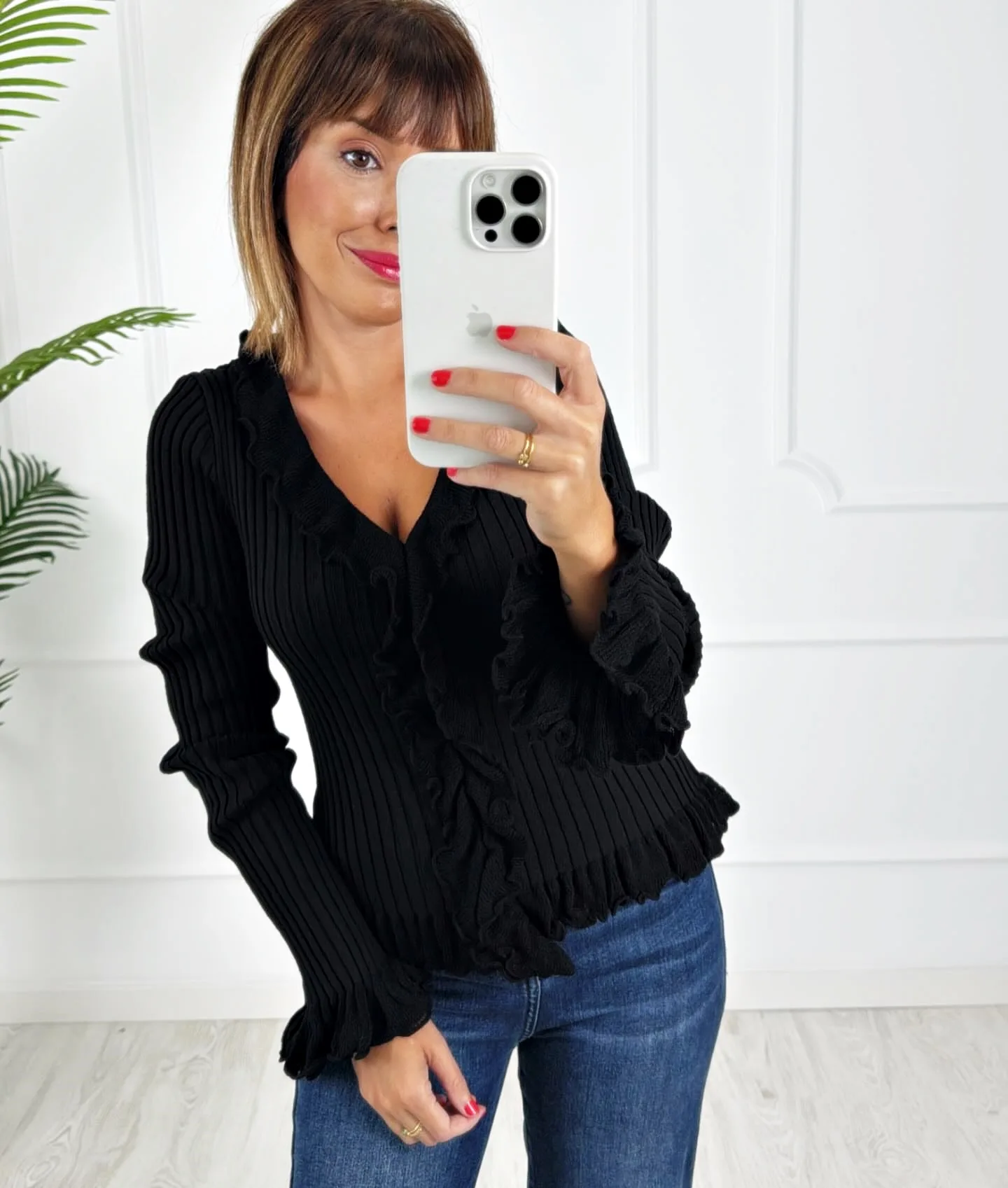 Jersey botones volantes negro