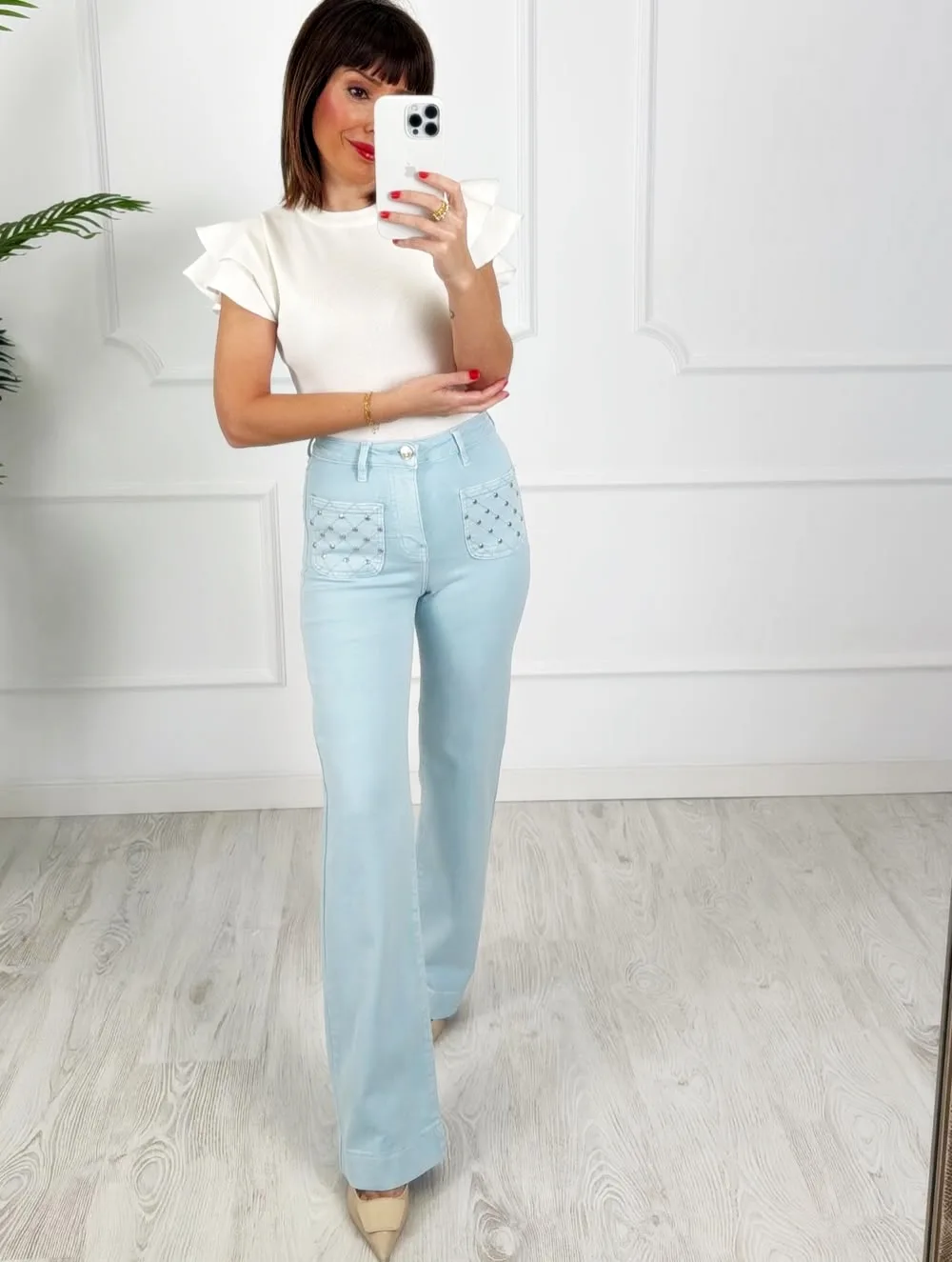 Pantalón bolsillos tachas azul