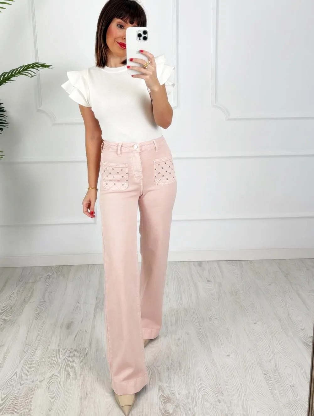 Pantalón bolsillos tachas rosa