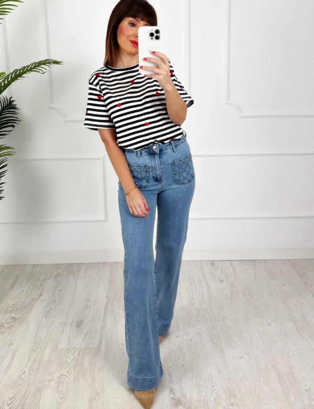 Pantalón bolsillos tachas denim