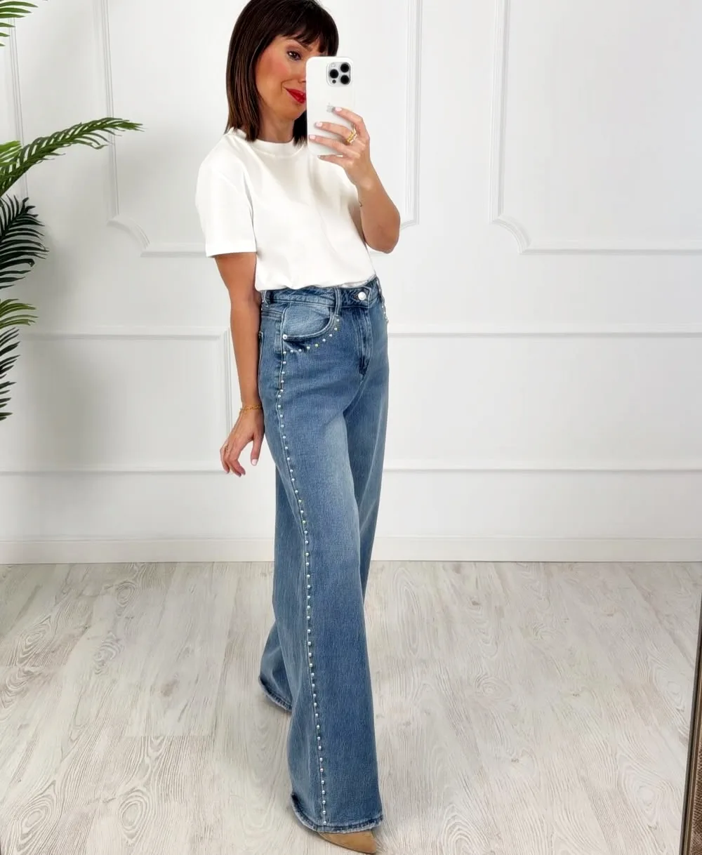 Pantalón tachas denim